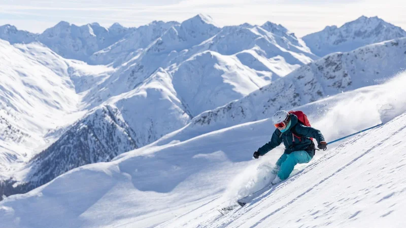 Skier on the slopes at Livigno ski resort in the Italian Alps