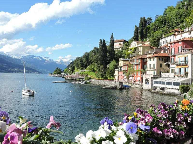 View from a boat approaching a lakeside village on Lake Como